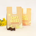 Load image into Gallery viewer, Gizzls Soft Bites peanut butter and banana soft dog treats in two pouches with treats