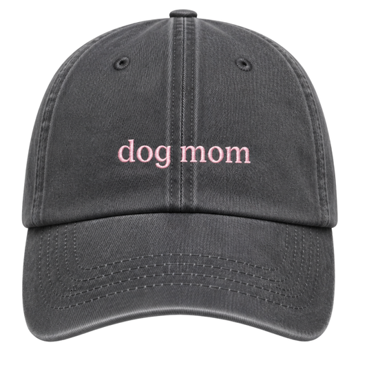 Gray cap with 'dog mom' embroidered in pink on a white background