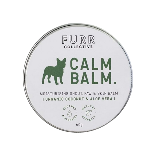 natural dog balm in tin with white and green label 
