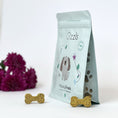 Load image into Gallery viewer, Gizzls Minty Fresh peanut butter and mint dog treats pouch with treats
